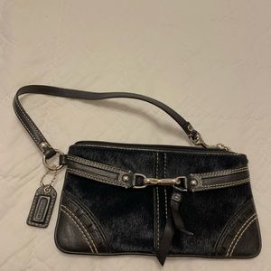 Coach wristlet, black cowhide and leather